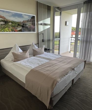 bg-chambre-confort-001-699d5b8f859c7.jpg